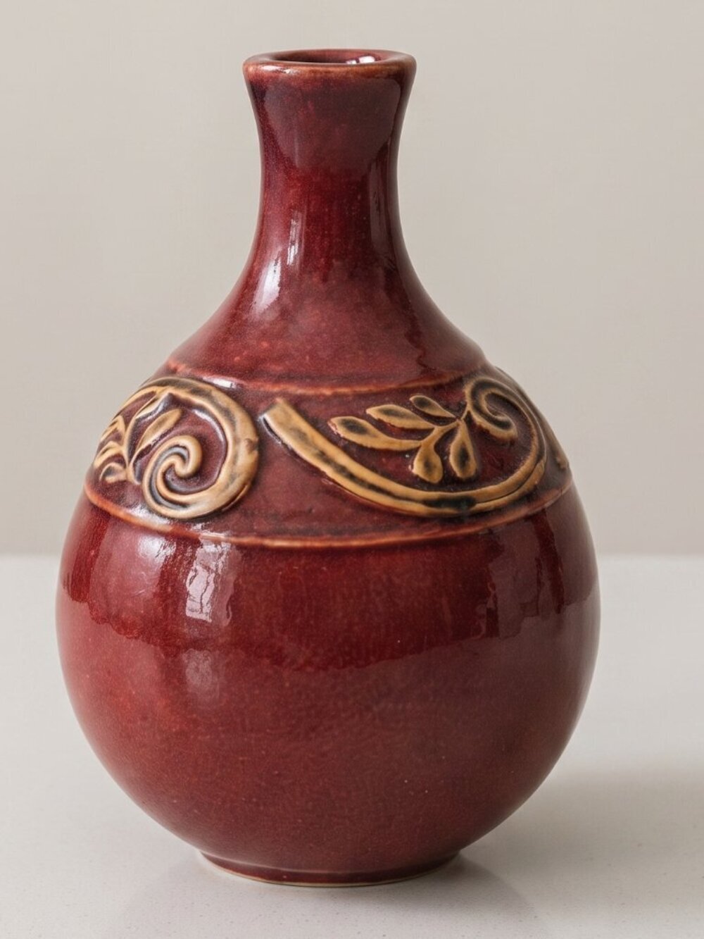 Vintage Red Glazed Art Pottery Bud Vase Raised Spiral Botanical Design 7.5”